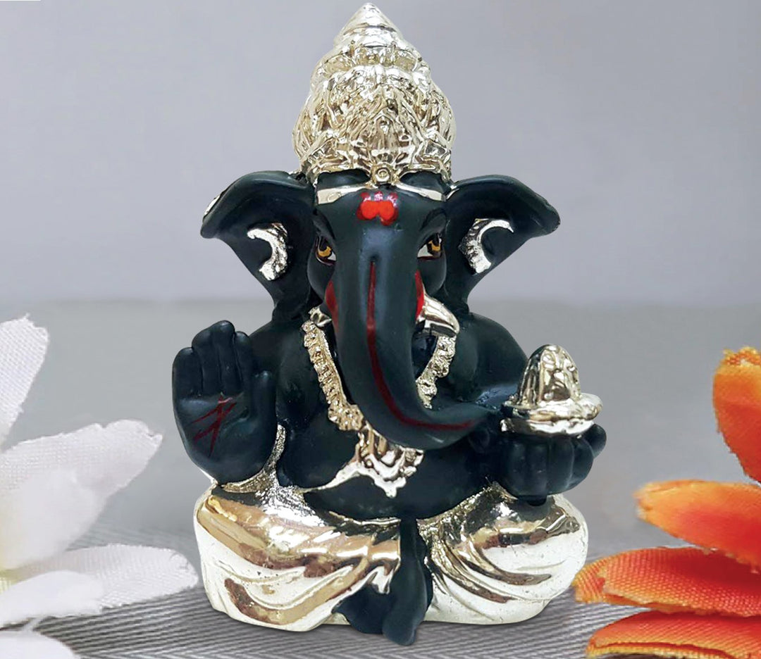 Captivating Silver-Plated Black Sitting Ganesha Idol