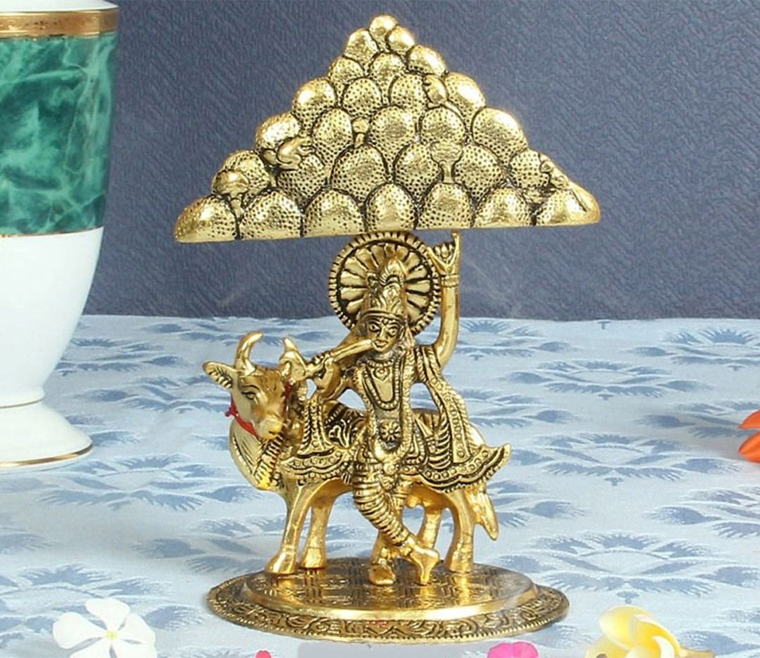 Captivating Krishna Lifting Mount Govardhan Showpiece in Antique Gold