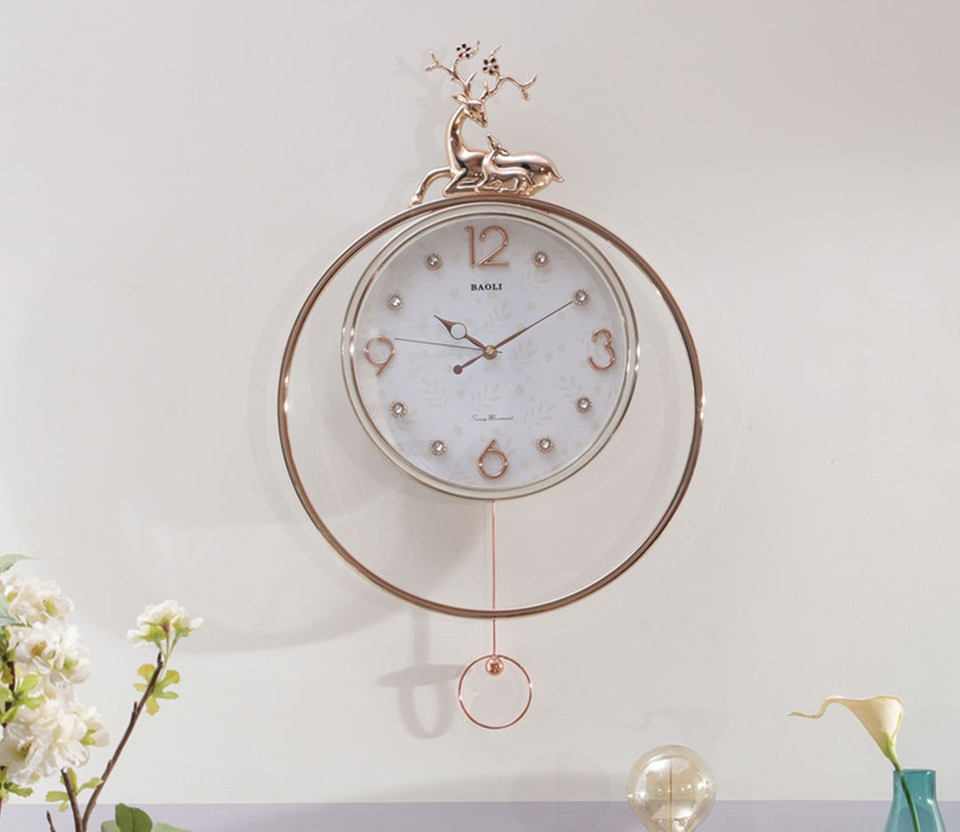 Reindeer Pendulum Clock in Rose Gold