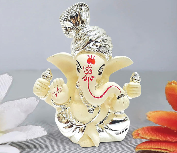 Captivating Sitting Ganesha Idol in White with Silver Pagdi