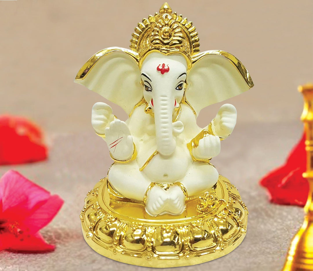 Captivating Mini Ganesha Idol in Gleaming Gold and White with Base