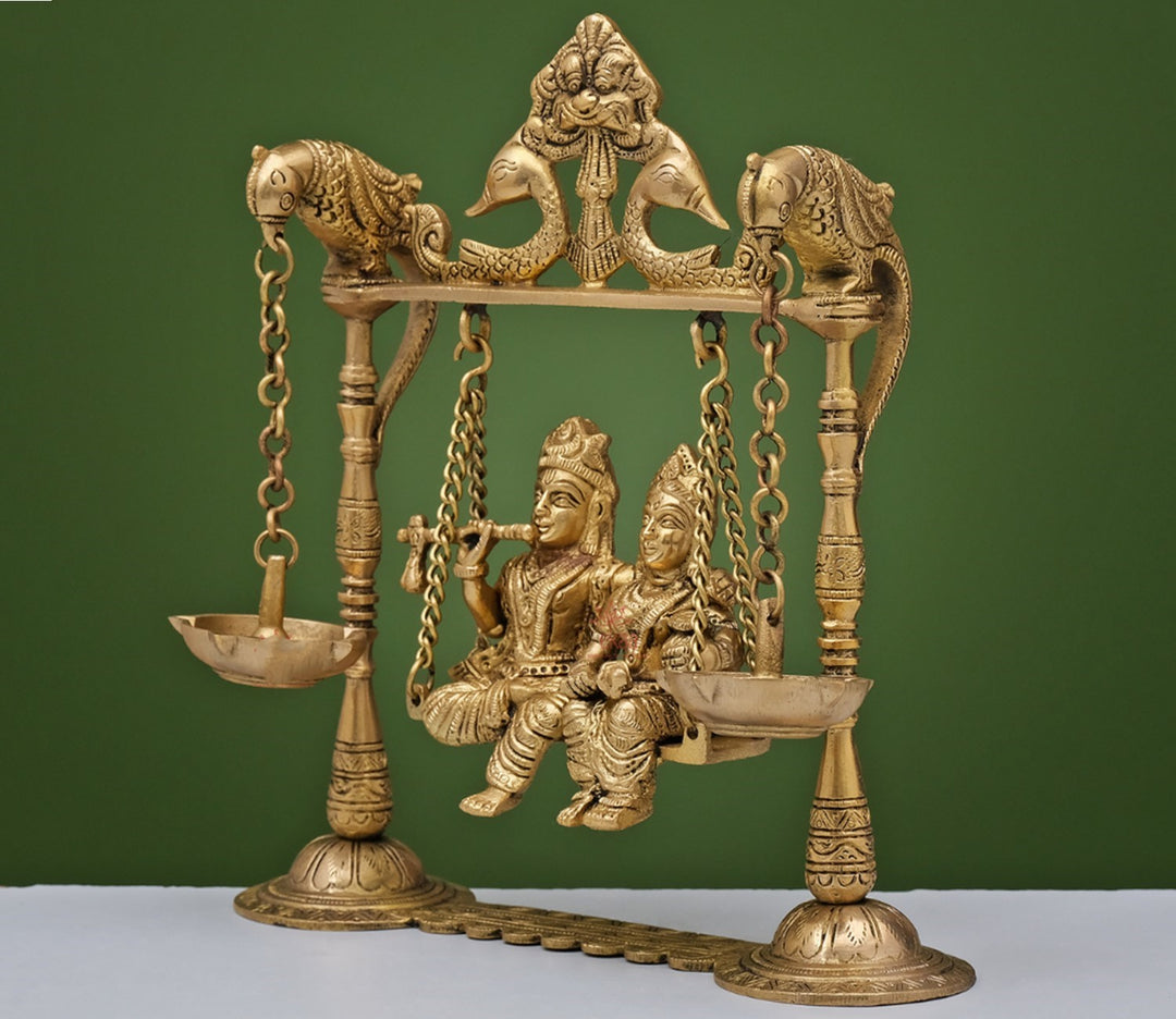 Enchanting Brass Statue of Lord Krishna on Swing with Diya