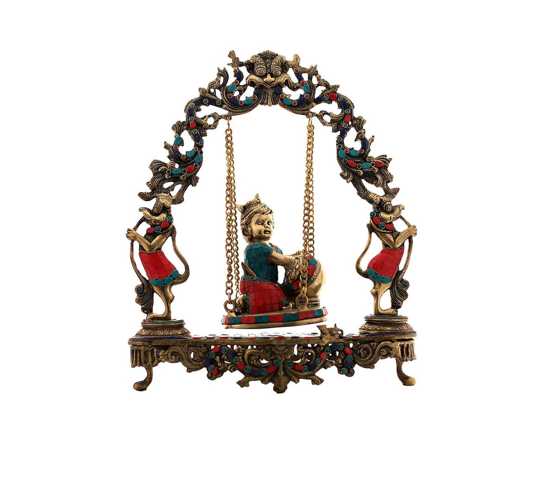 Ornate Brass Figurine on a Swing