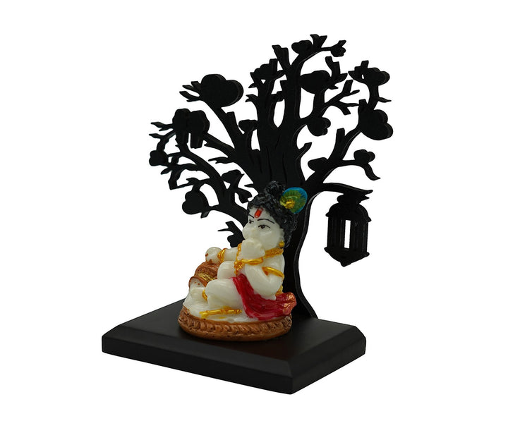 Decorative Figurine with Cultural Significance and Wooden Tree