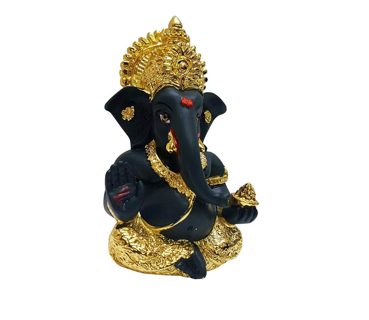 Captivating Black Ganesha Idol with Gold Mukut