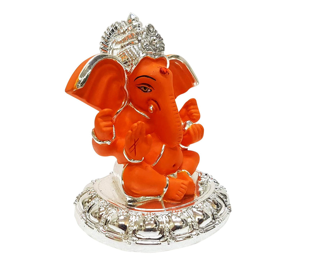 Captivating Sitting Ganesha Idol in Orange with Silver Base