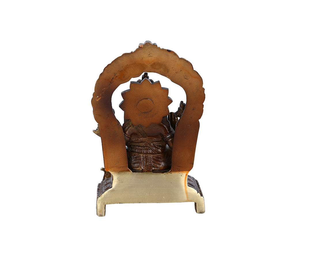 Ornate Brass Figurine on a Throne