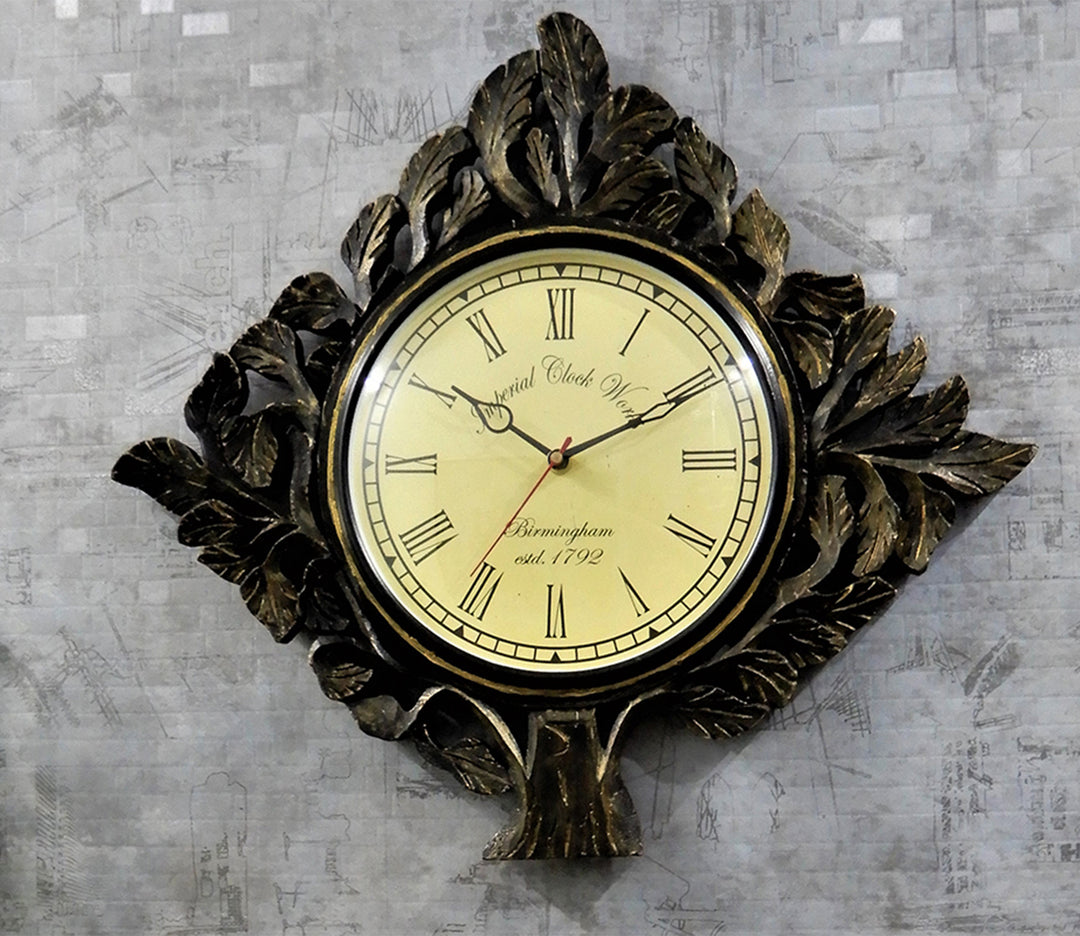 Striking Black and Gold Tree Silhouette Wall Clock